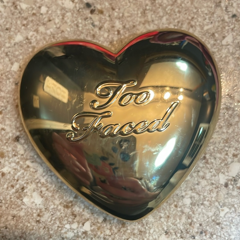 Too Faced love light prismatic highlighter